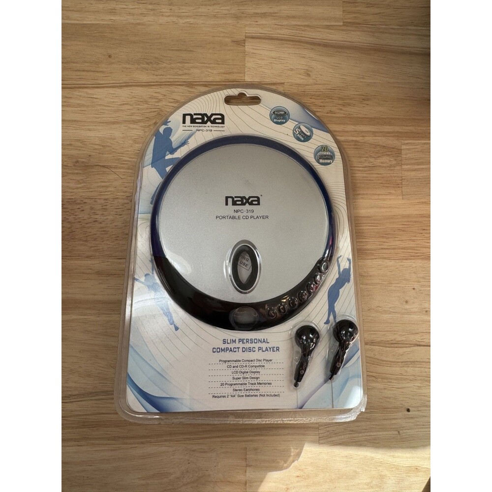 NIB Sealed Naxa Super Slim Personal Compact Disc Player Headphones NPC-321